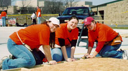 Students working on a Habitat for Humanity project.