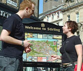 couple beside Stirling Map in town centre